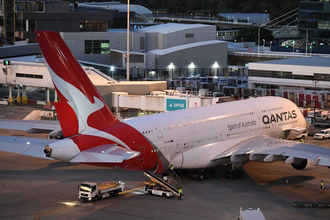 A Qantas Airbus A380 airplane at the gate at an airport