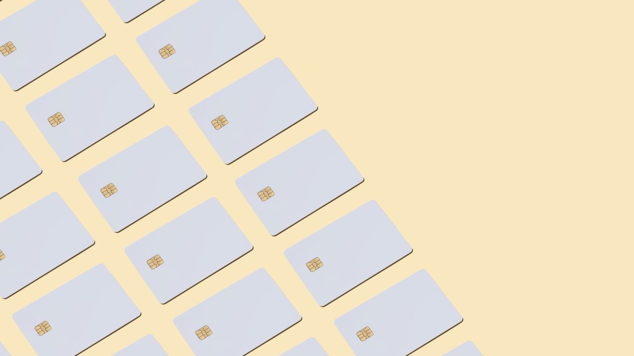 White credit cards on a yellow background