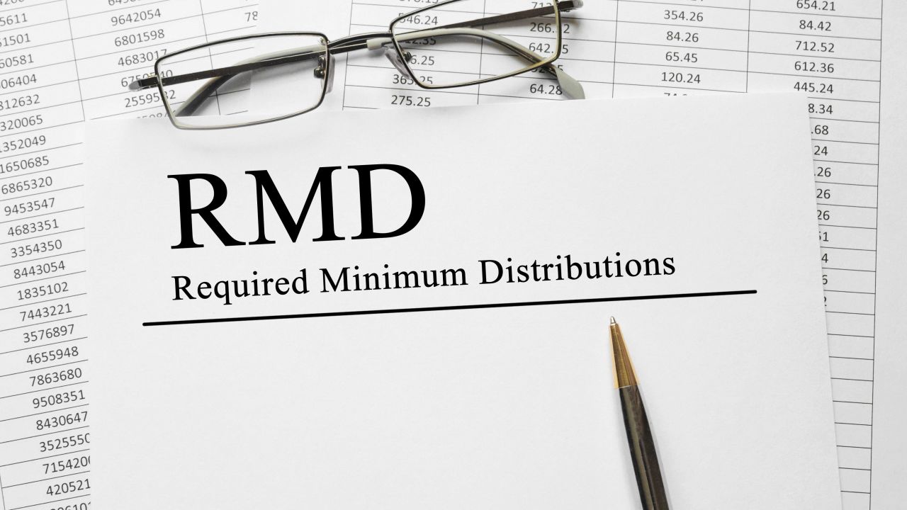 A piece of paper with Required Minimum Distributions RMD on it