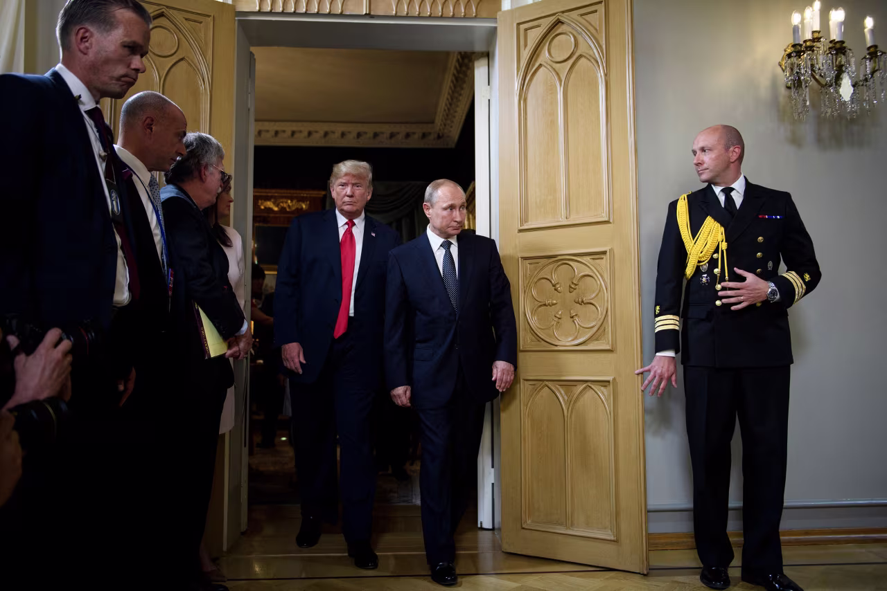 US President Donald Trump and Russia's President Vladimir Putin arrive for a meeting at Finland's Presidential Palace in Helsinki, Finland, on July 16, 2018.
