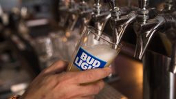In this photo illustration, a bartender pours a Bud Light from a tap, July 26, 2018 in New York City.