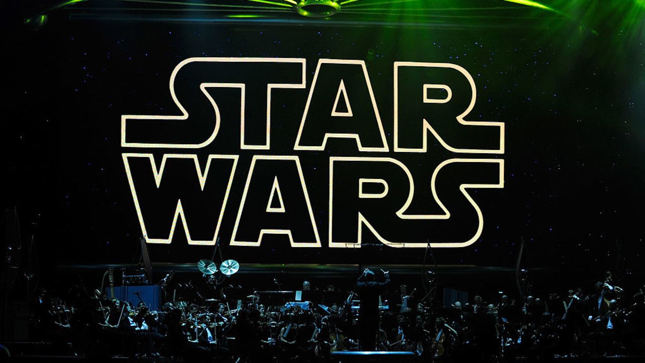 LAS VEGAS - MAY 29:  The opening title from the Star Wars film series is shown on screen while musicians perform during "Star Wars: In Concert" at the Orleans Arena May 29, 2010 in Las Vegas, Nevada. The traveling production features a full symphony orchestra and choir playing music from all six of John Williams' Star Wars scores synchronized with footage from the films displayed on a three-story-tall, HD LED screen.  (Photo by Ethan Miller/Getty Images)