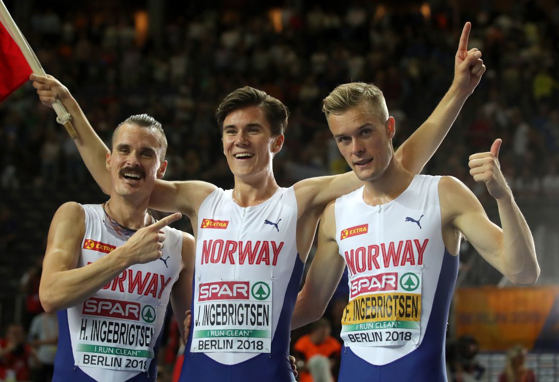 From left to right, Henrik, Jakob and Filip Ingebrigtsen celebrate during the 2018 European Championships in Berlin.