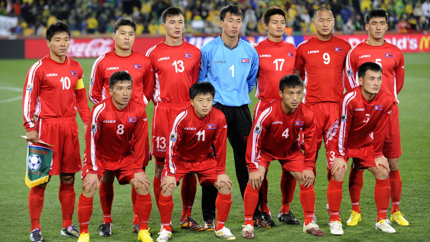 The North Korean team posing ahead of a match against Brazil in the 2010 World Cup group stage.