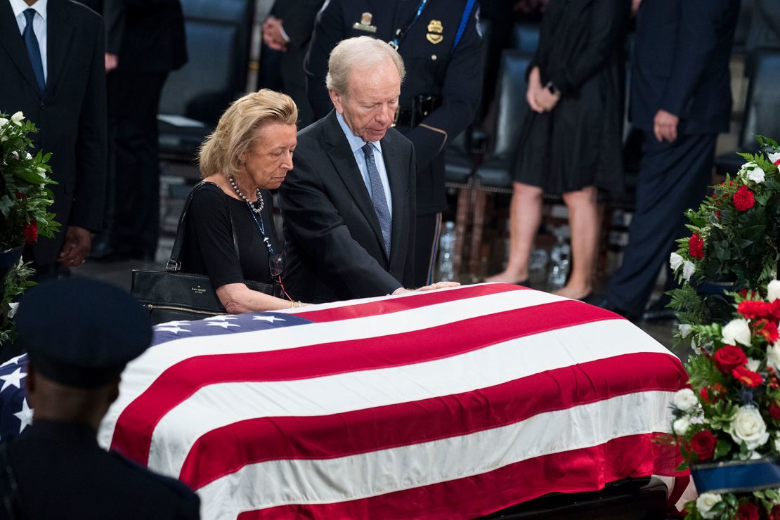  Former Sen. Joe Lieberman and his wife, Hadassah, pay respects to the late Sen. John McCain as the senator lies in state in the Capitol rotunda on August 31, 2018.