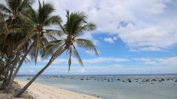 This photograph taken on September 2, 2018 shows a beach view in Ewa on the Pacific island of Nauru. - A cluster of corrugated iron huts resembling military barracks jut out of Nauru's sweltering rocky landscape to reveal refugee settlement camp number five, a place defined by desperation and rarely visited by outsiders. (Photo by Mike LEYRAL / AFP) (Photo credit should read MIKE LEYRAL/AFP via Getty Images)
