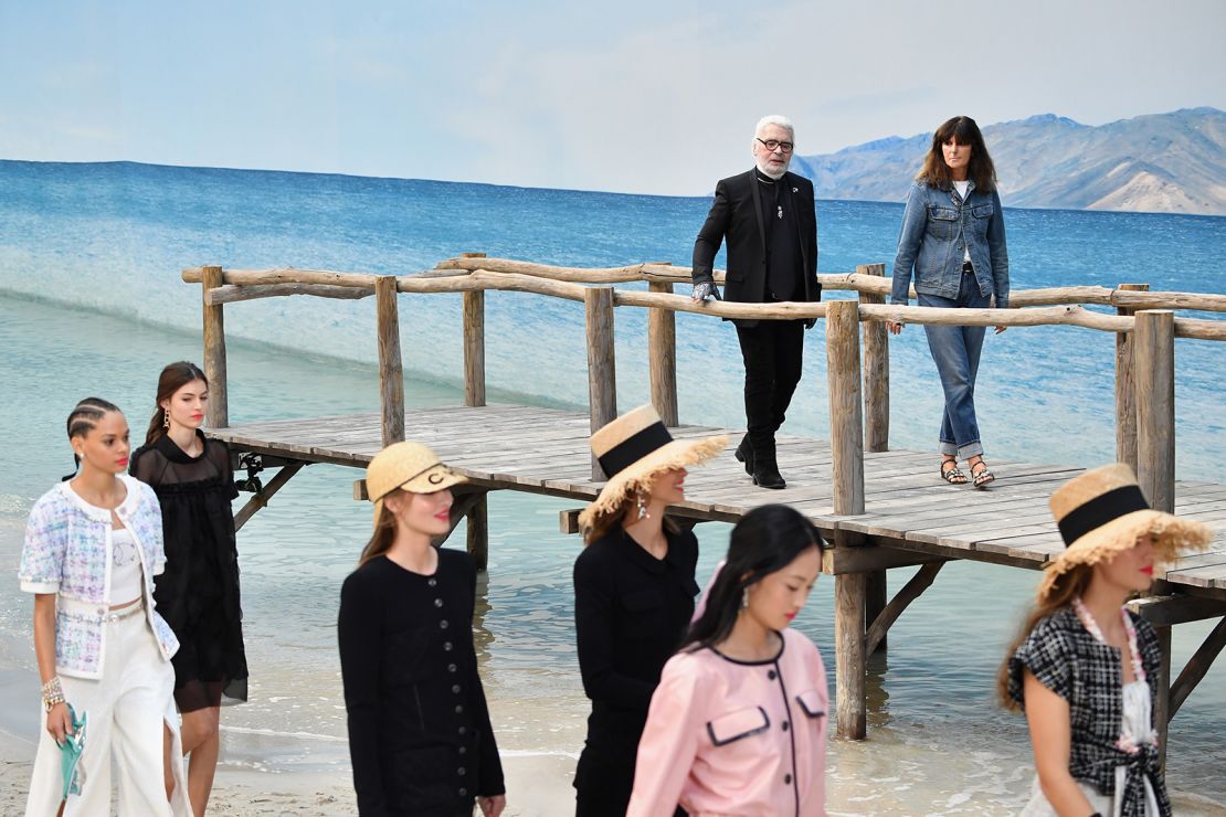 Karl Lagerfeld and Virginie Viard walk the runway during the Chanel show as part of Paris Fashion Week on October 2, 2018 in Paris, France.