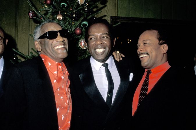 Left to right: Ray Charles, Lou Rawls and Jones are seen together during a United Negro College Fund party in Beverly Hills in 1987.