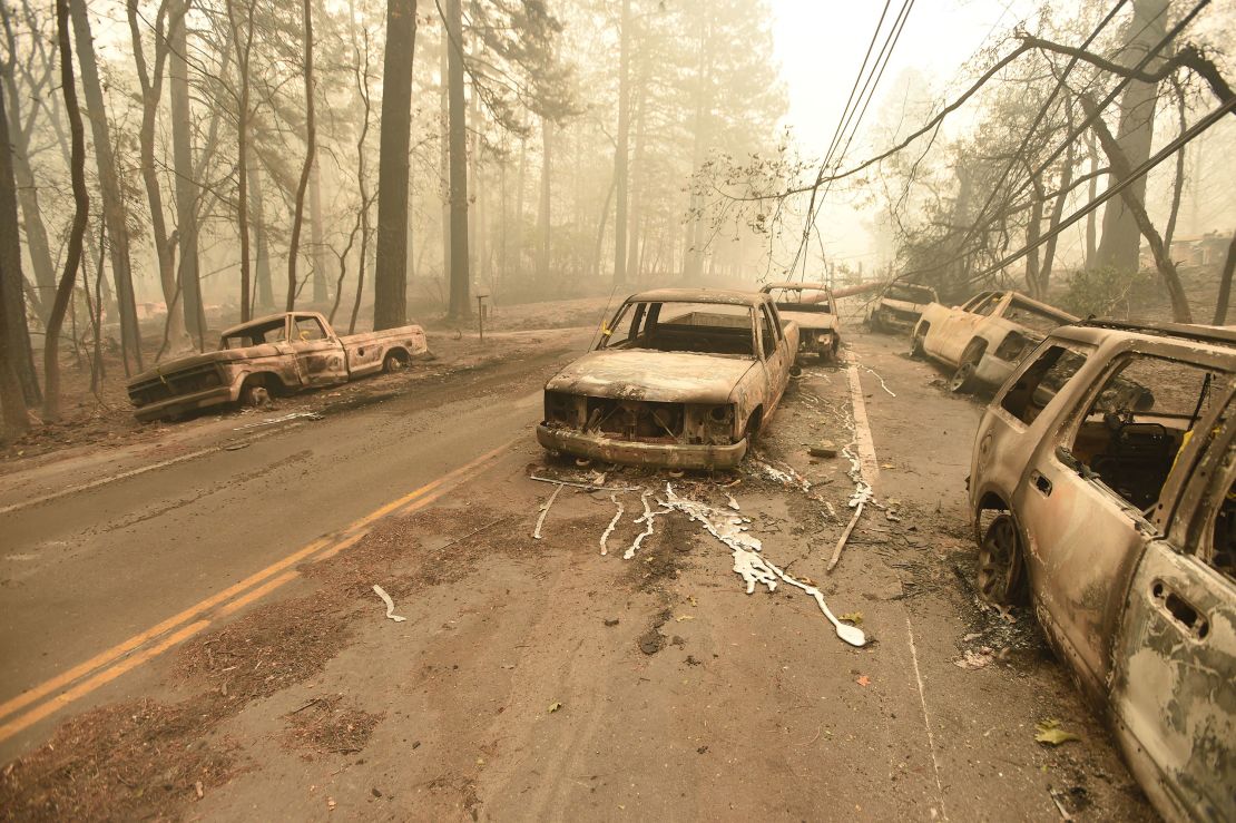 Burned vehicles on the road in Paradise, California, after the Camp Fire tore through the area on November 10, 2018.