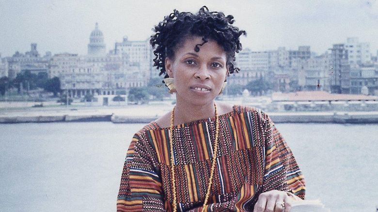 Havana, Cuba: JoAnn Chesimard, aka Assata Shakur, holding the manuscript of her autobiography with Old Havana, Cuba, in the background on October 7, 1987. (Photo by Ozier Muhammad/Newsday RM via Getty Images)