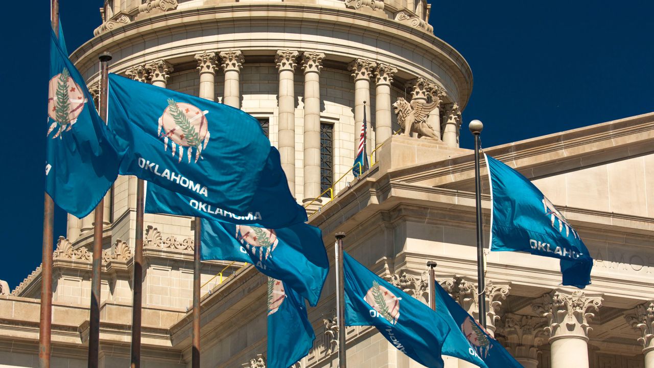 State flags fly over the Oklahoma State Capitol in Oklahoma City, Oklahoma.