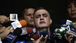 Venezuelan Prosecutor Tarek William Saab, delivers a statement at the Supreme Court of Justice in Caracas to announce he has asked the Supreme Court to bar Venezuela's National Assembly head and self-proclaimed "acting president" Juan Guaido, from leaving Venezuela and to freeze his assets, on January 29, 2019. (Photo by Federico Parra / AFP) / The erroneous mention[s] appearing in the metadata of this photo by Federico Parra                       has been modified in AFP systems in the following manner: [Venezuelan Prosecutor Tarek William Saab, delivers a statement at the Supreme Court of Justice in Caracas to announce he has asked the Supreme Court to bar Venezuela's National Assembly head and self-proclaimed "acting president" Juan Guaido, from leaving Venezuela and to freeze his assets, on January 29, 2019.] instead of [Venezuelan Prosecutor Tarek William Saab, delivers a statement at the Supreme Court of Justice in Caracas to announce he has barred Venezuela's National Assembly head and self-proclaimed "acting president" Juan Guaido, from leaving Venezuela and has freezed his assets, on January 29, 2019.]. Please immediately remove the erroneous mention[s] from all your online services and delete it (them) from your servers. If you have been authorized by AFP to distribute it (them) to third parties, please ensure that the same actions are carried out by them. Failure to promptly comply with these instructions will entail liability on your part for any continued or post notification usage. Therefore we thank you very much for all your attention and prompt action. We are sorry for the inconvenience this notification may cause and remain at your disposal for any further information you may require.        (Photo credit should read FEDERICO PARRA/AFP via Getty Images)