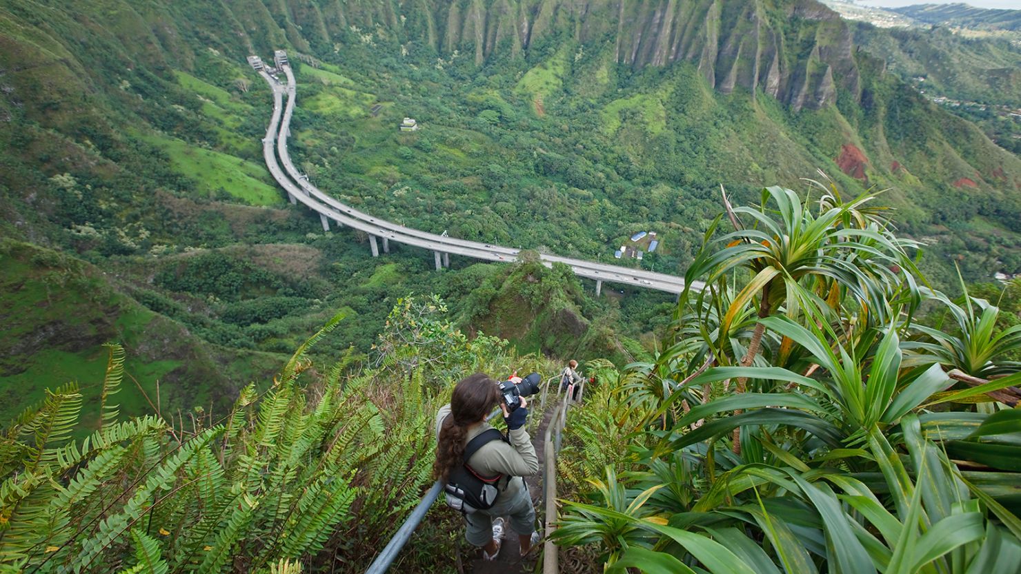 Visitors hiking the Haiku Stairs in Kaneohe, Oahu, Hawaii.