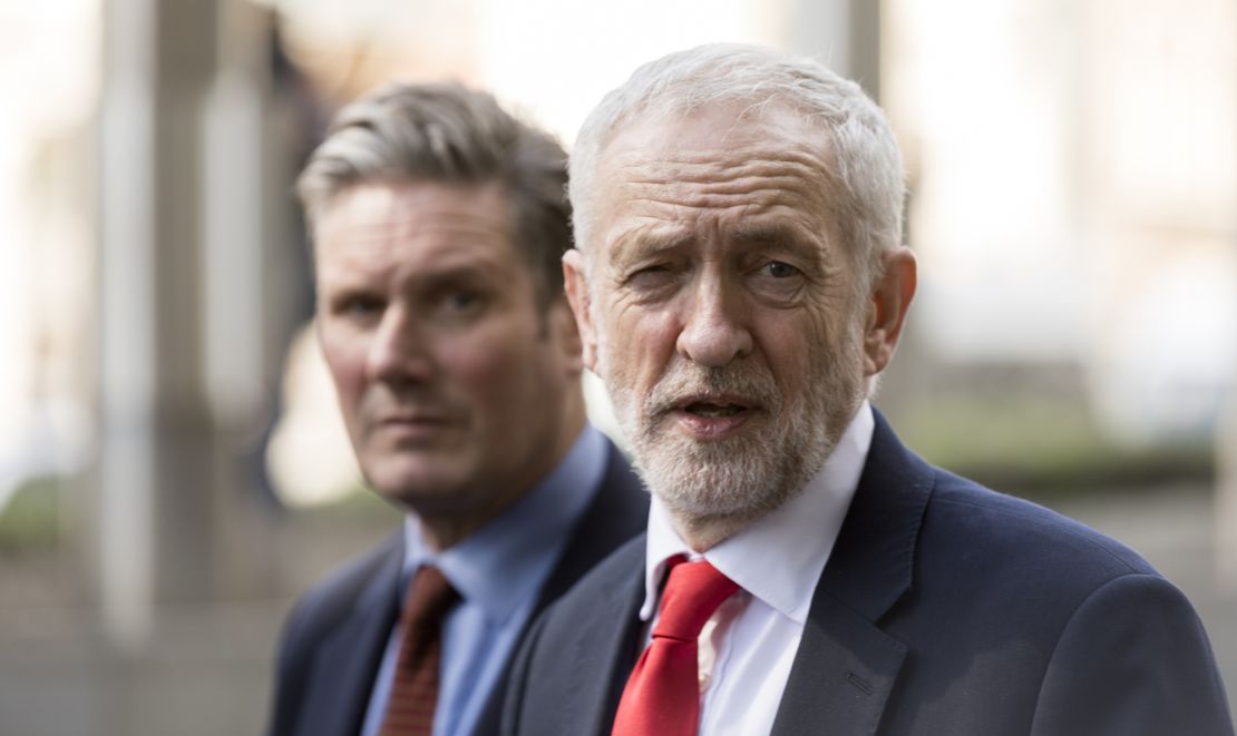 Starmer, left, and then-Labour leader Jeremy Corbyn talk to the media at the EU Commission headquarters on March 21, 2019 in Brussels, Belgium.