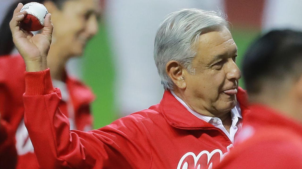 MEXICO CITY, MEXICO - MARCH 23: Andres Manuel Lopez Obrador, President of Mexico pitches the first ball prior a friendly game between San Diego Padres and Diablos Rojos at Alfredo Harp Helu Stadium on March 23, 2019 in Mexico City, Mexico. The game is held as part of the opening celebrations of the Alfredo Harp Helu Stadium, now the newest in Mexico to play baseball. (Photo by Hector Vivas/Getty Images)