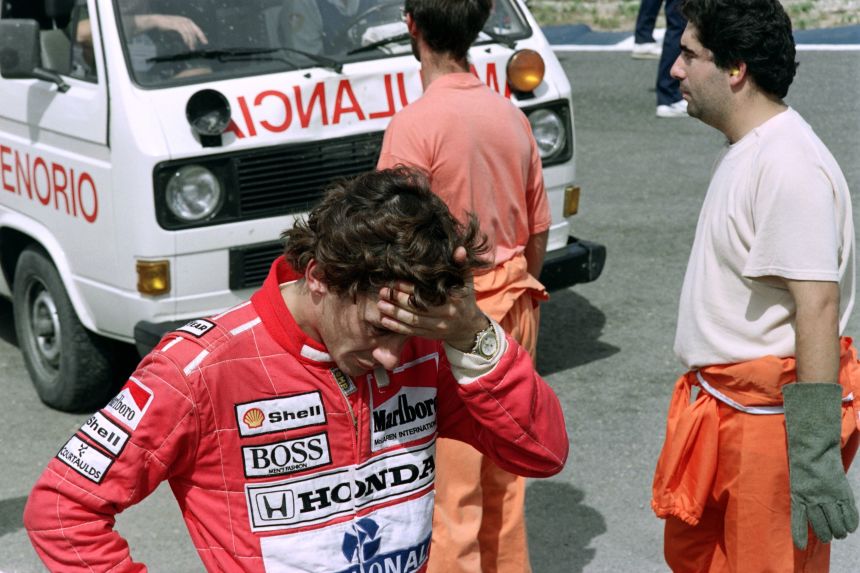 F1 legend Ayrton Senna reacts after having seen Donnelly's crash on September 28, 1990.