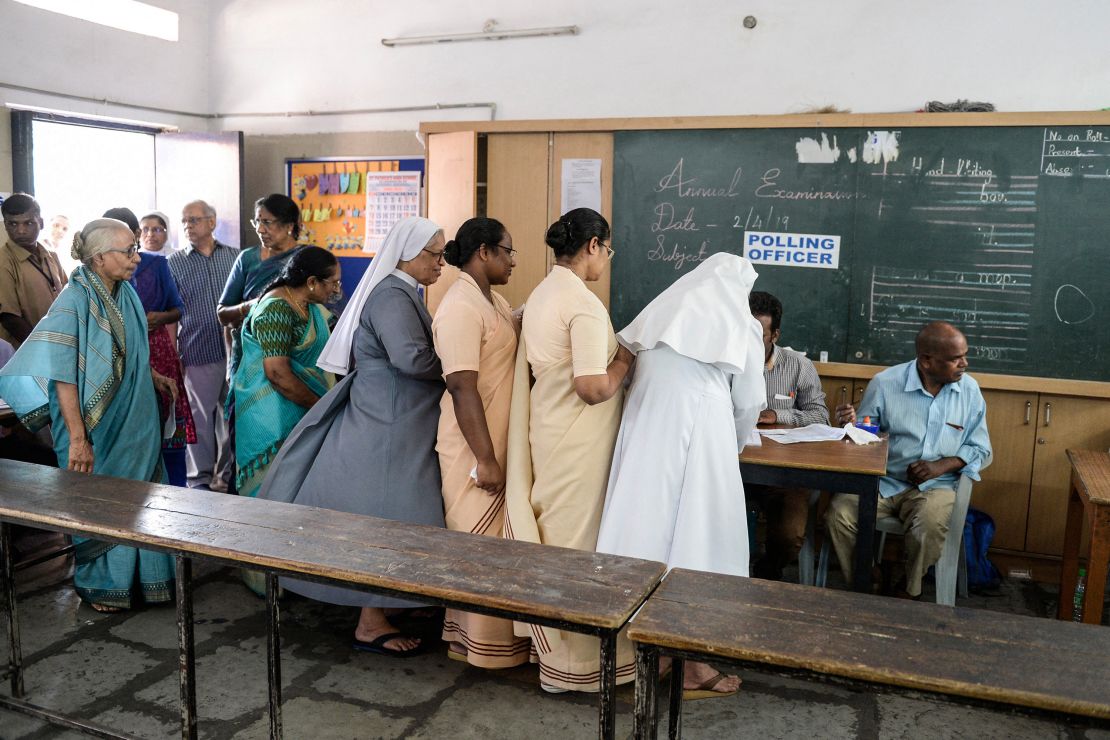 TOPSHOT - People register to vote at a polling station during India's general election in Hyderabad on April 11, 2019. India's mammoth six-week general election kicked off April 11, with polling stations in the country's northeast among the first to open. (Photo by NOAH SEELAM / AFP) (Photo by NOAH SEELAM/AFP via Getty Images)