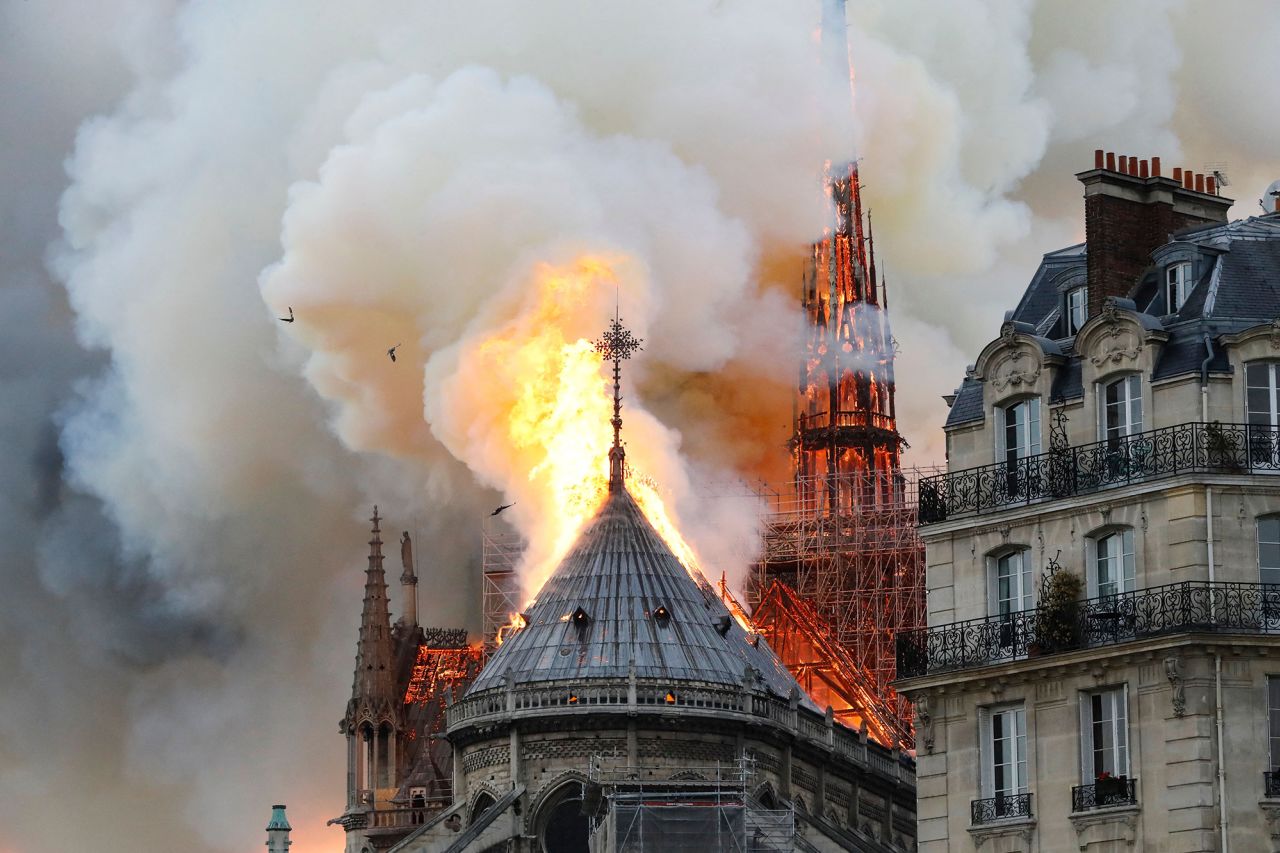 Smoke and flames rise at Notre Dame cathedral in central Paris on April 15, 2019. Renovations had been taking place at the site at the time though the cause is believed to have been accidental.