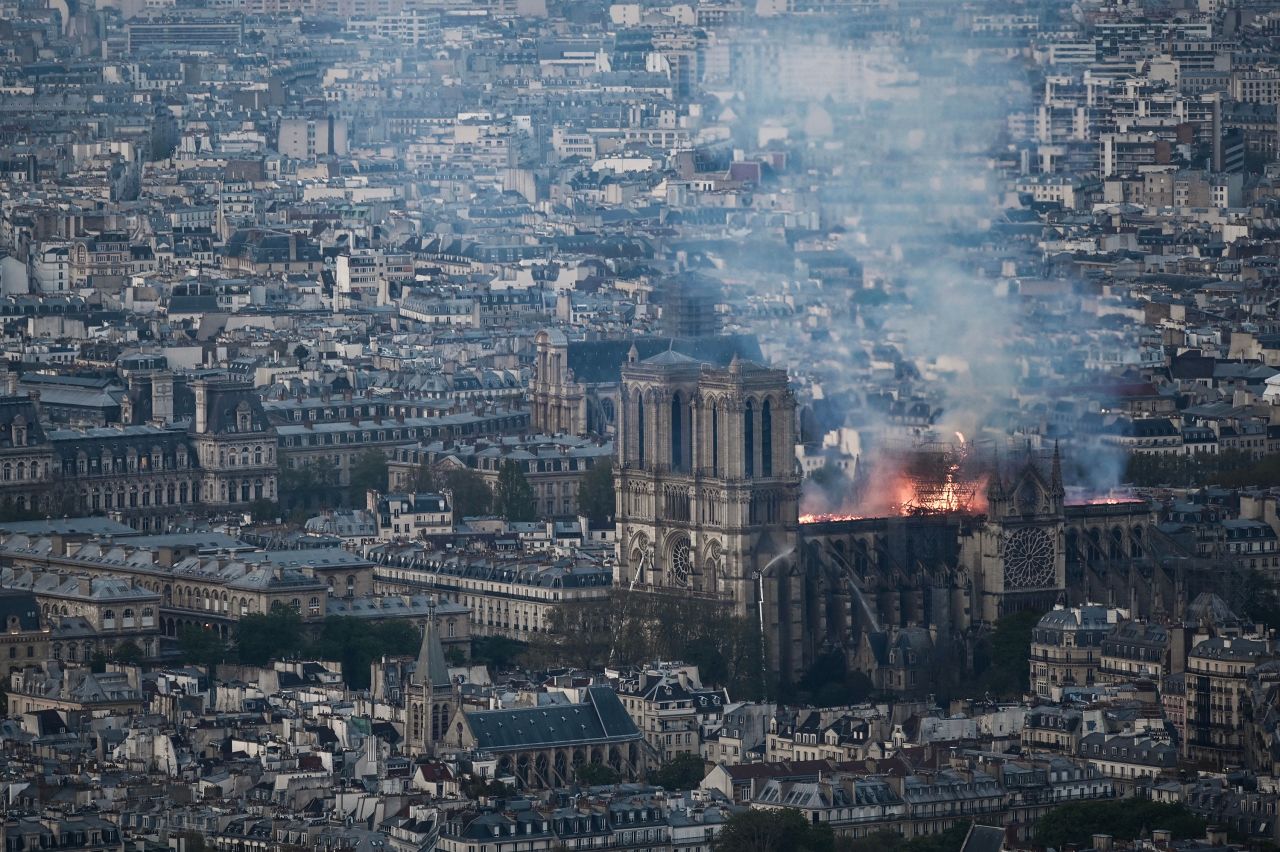 Smoke and flames rise during the fire at the historic monument.