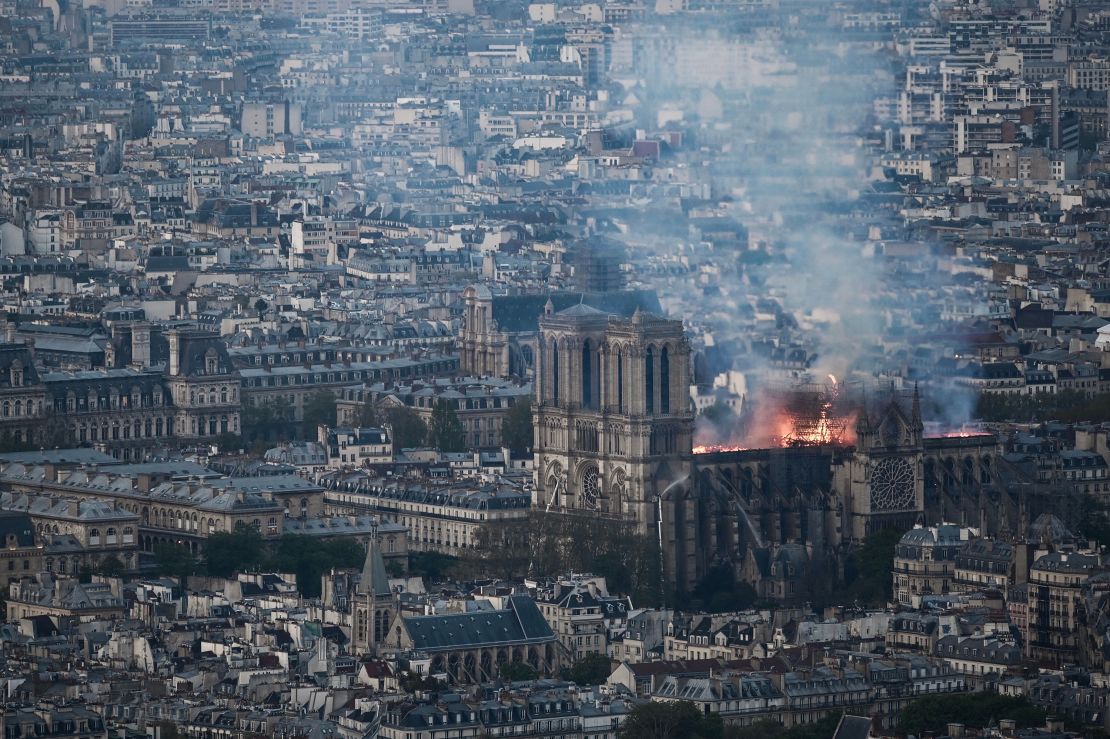 Smoke and flames rise from the burning Notre Dame cathedral on April 15, 2019.