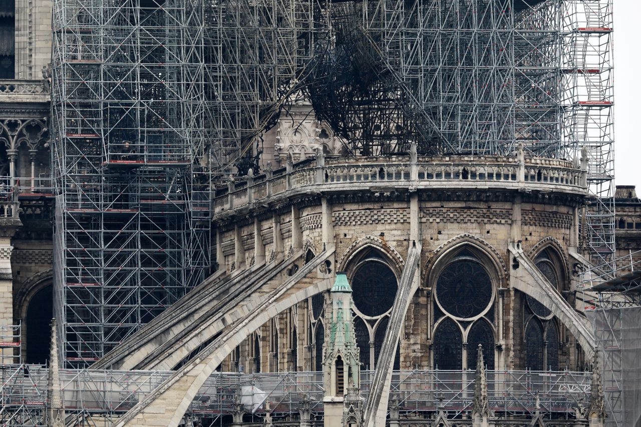 A view of Notre Dame a day after a major fire broke out and quickly spread across the building, causing its famous spire to collapse.