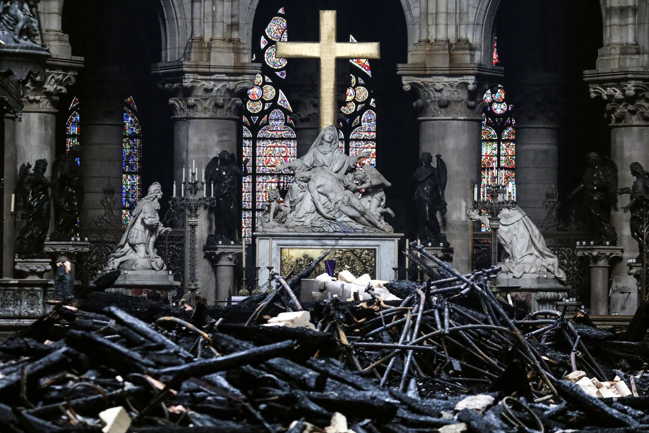 The cathedral's altar is surrounded by charred debris in the aftermath of the devastating blaze that took place during renovation of the historic monument.