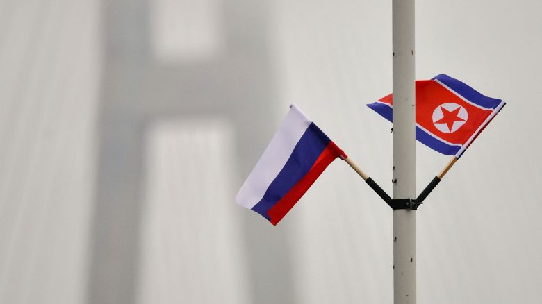 Flags of Russia and North Korea are seen fixed on a lamp post on Russky island in the far-eastern Russian port of Vladivostok on April 23, 2019. North Korean leader Kim Jong Un will "soon" visit Russia for his first summit with President Vladimir Putin, North Korea's official KCNA news service reported Tuesday, confirming a Kremlin announcement. (Photo by AFP) (Photo by STR/AFP via Getty Images)          