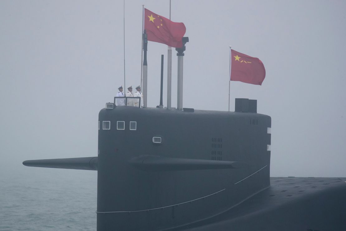 A type 094 Jin-class nuclear-capable ballistic missile submarine of the Chinese People's Liberation Army (PLA) Navy participates in a naval parade in 2019.