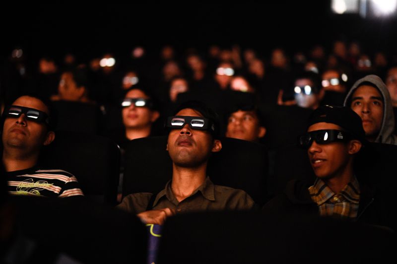 Venezuelan filmgoers watch the first screening in Venezuela of Marvel Studios'
