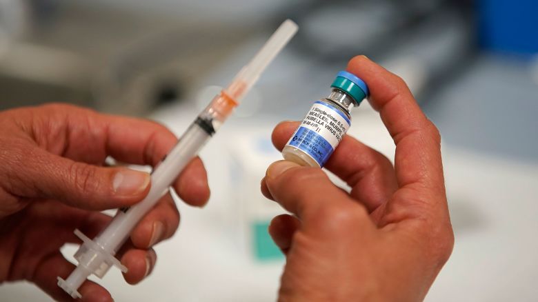 SALT LAKE CITY, UT - APRIL 26: In this photo illustration a one dose bottle of measles, mumps and rubella virus vaccine, made by MERCK, is held up at the Salt Lake County Health Department on April 26, 2019 in Salt Lake City, Utah. (Photo Illustration by George Frey/Getty Images)