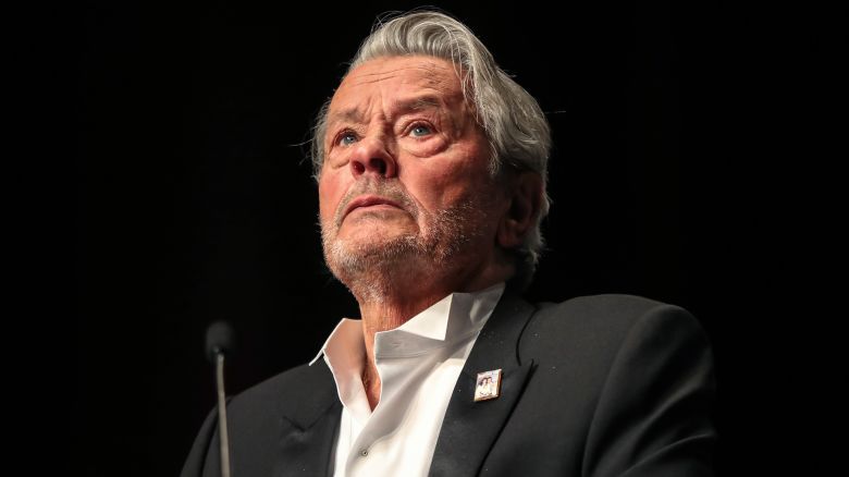 French actor Alain Delon reacts as he is awarded with an Honorary Palme d'Or at the 72nd edition of the Cannes Film Festival in Cannes, southern France, on May 19, 2019.