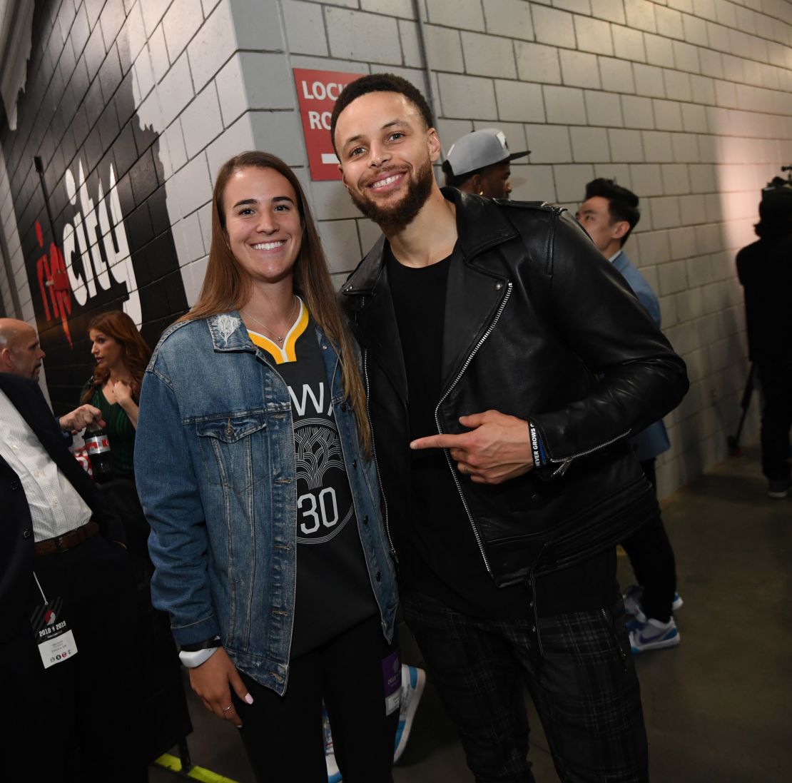 Curry and Ionescu pose for a photo together in 2019.