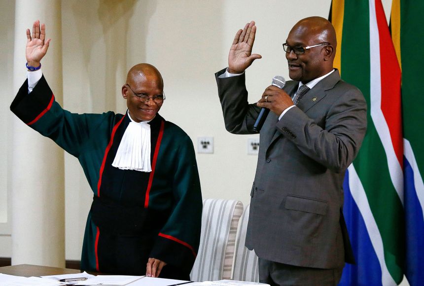 Mthethwa (right) being sworn in as South Africa's minister of sports, arts and culture in May 2019 in Pretoria.