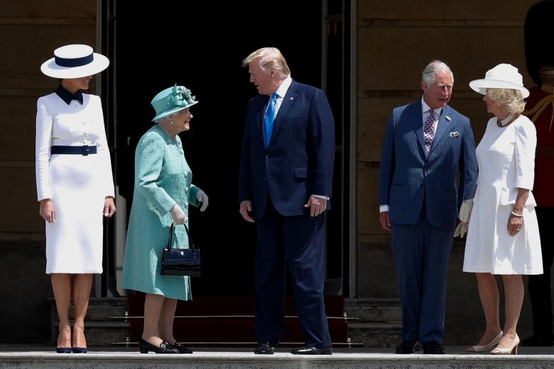 The late Queen Elizabeth II speaks with President Trump during a welcome ceremony at Buckingham Palace marking the start his 2019 state visit.