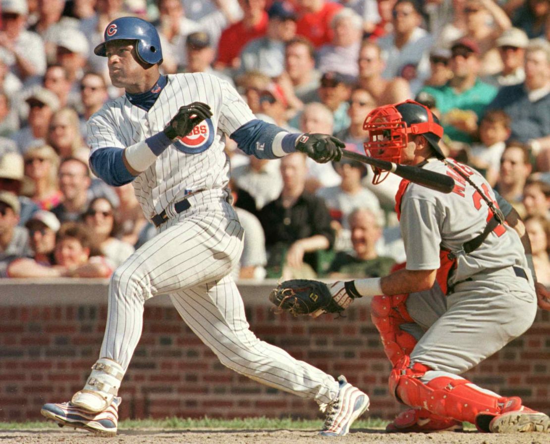 Sammy Sosa hits a home run at Wrigley Field against the St. Louis Cardinals in 1999.