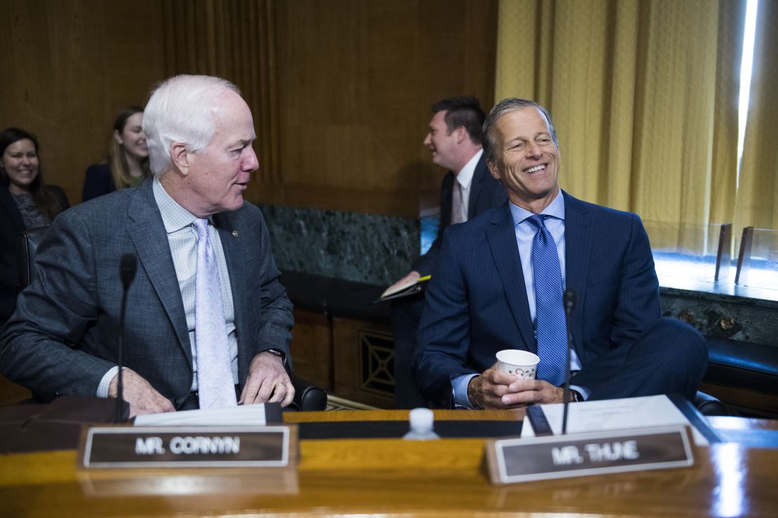 Texas Republican Sen. John Cornyn and South Dakota Republican Sen. John Thune attend a Senate Finance Committee hearing in Washington in 2019.