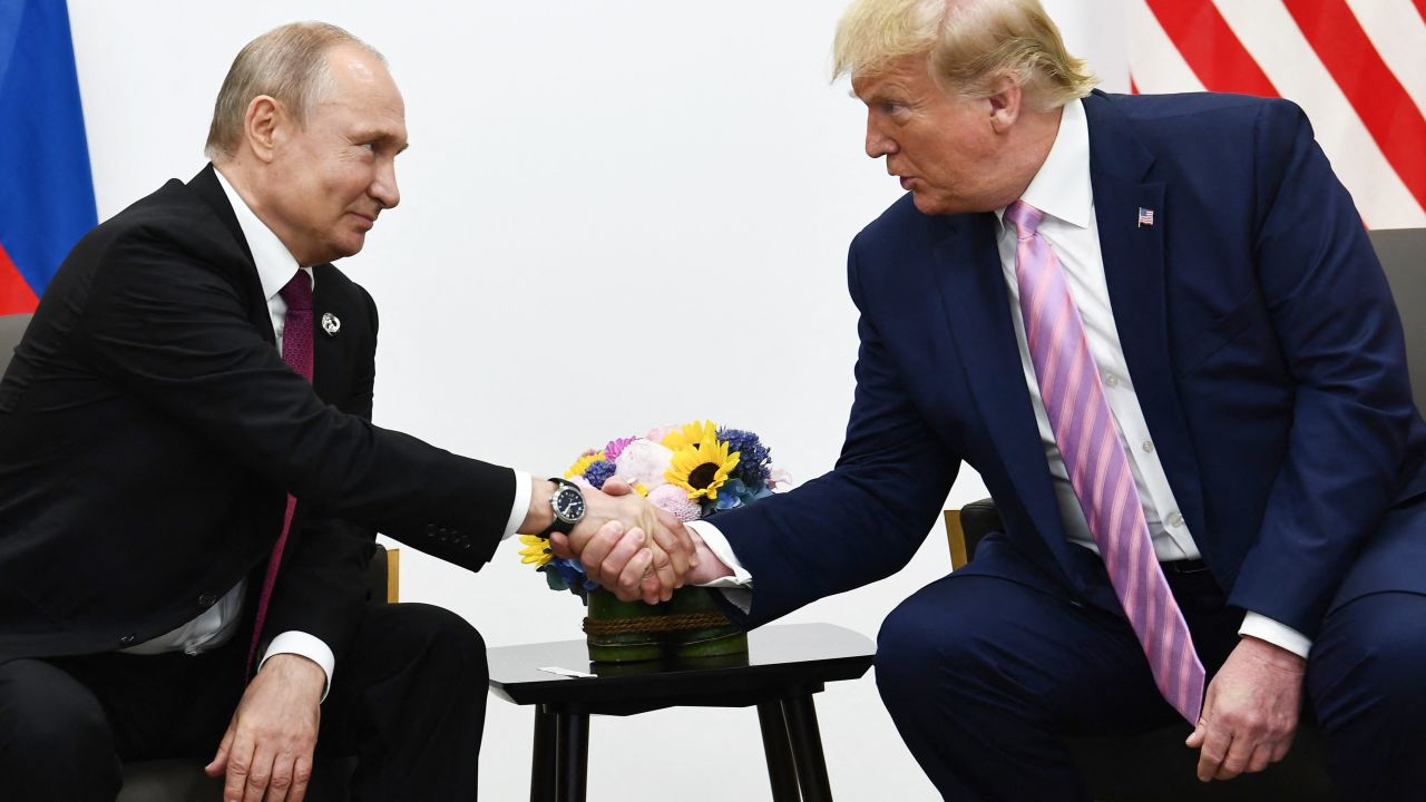 US President Donald Trump (R) attends a meeting with Russia's President Vladimir Putin during the G20 summit in Osaka on June 28, 2019. (Photo by Brendan Smialowski / AFP) (Photo by BRENDAN SMIALOWSKI/AFP via Getty Images)