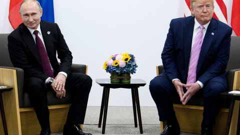 US President Donald Trump (R) attends a meeting with Russia's President Vladimir Putin during the G20 summit in Osaka on June 28, 2019. (Photo by Brendan Smialowski / AFP) (Photo by BRENDAN SMIALOWSKI/AFP via Getty Images)