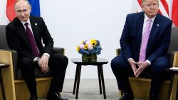 US President Donald Trump (R) attends a meeting with Russia's President Vladimir Putin during the G20 summit in Osaka on June 28, 2019. (Photo by Brendan Smialowski / AFP) (Photo by BRENDAN SMIALOWSKI/AFP via Getty Images)