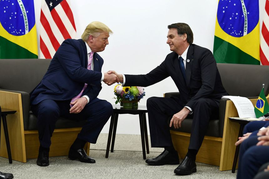 Then-Brazilian President Jair Bolsonaro, right, meets with President Donald Trump in Osaka, Japan, during a bilateral meeting on the sidelines of the 2019 G20 Summit.
