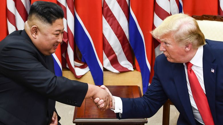 North Korea's leader Kim Jong Un and President Donald Trump shake hands during a meeting on the south side of the Military Demarcation Line that divides North and South Korea, in the Joint Security Area of Panmunjom in the Demilitarized Zone on June 30, 2019.
