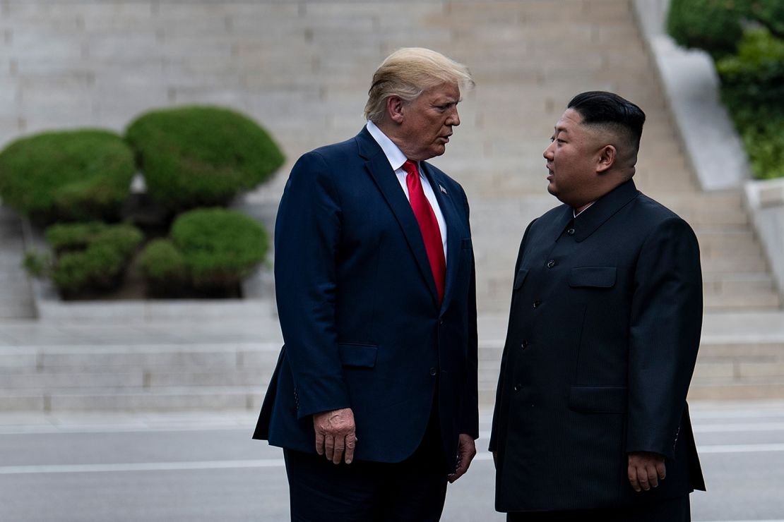 US President Donald Trump and North Korea's leader Kim Jong Un stand on North Korean soil while walking to South Korea in the demilitarized zone (DMZ) on June 30, 2019, in Panmunjom, Korea.