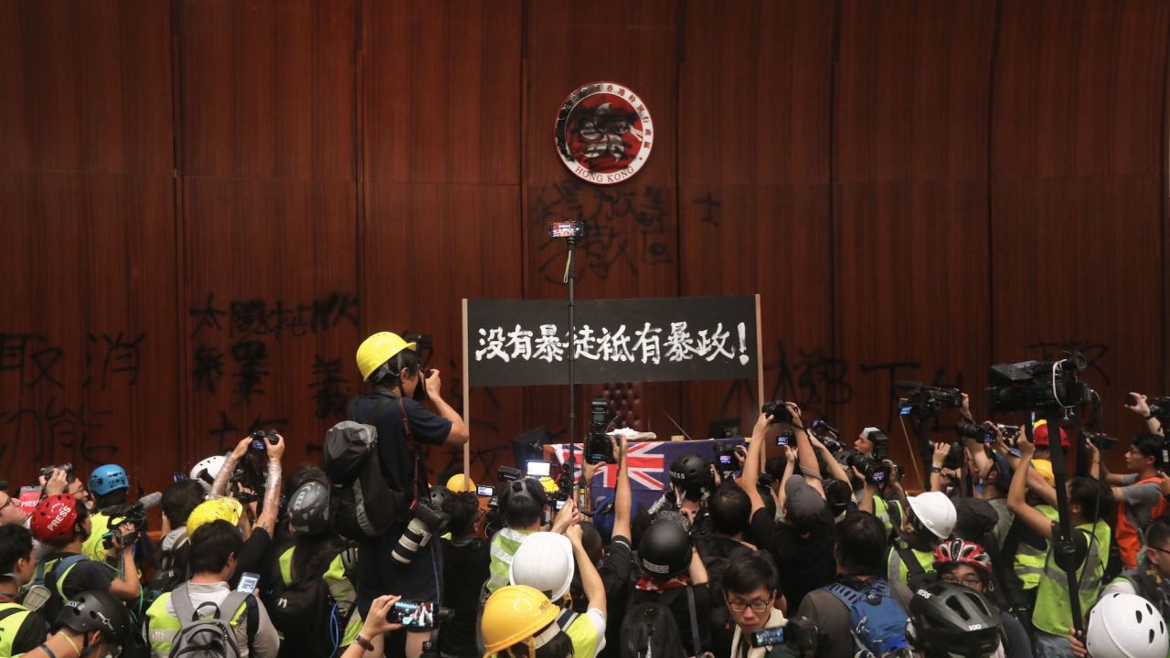 Protesters break into the parliament chambers of the government headquarters in Hong Kong on July 1, 2019, on the 22nd anniversary of the city's handover from Britain to China.