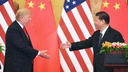 Then-US President Donald Trump and Chinese leader Xi Jinping shake hands during a press conference at the Great Hall of the People in Beijing in November 2017.
