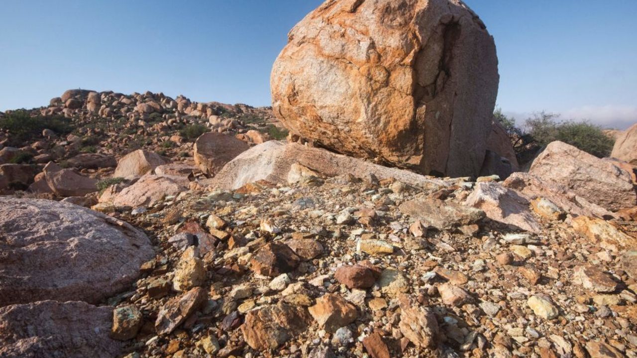 A view of rocks of many different colours close to Steenkampskraal (SKK) rare-earth mine on July 29, 2019, about 80Km from the Western Cape town of Vanrhynsdorp. - SKK has been confirmed as one of the highest grade deposits of rare-earth minerals in the world. The rare-earth minerals are used in the manufacture of powerful magnets, which are used in electric vehicles, wind turbines, robotics, and many other applications. The mine also produces naturally occurring radioactive thorium, which is used in medical and power generation applications. (Photo by RODGER BOSCH / AFP) (Photo by RODGER BOSCH/AFP via Getty Images)