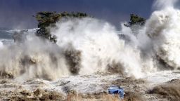 This picture taken on March 11, 2011 by Sadatsugu Tomizawa and released via Jiji Press on March 21, 2011 shows tsunami waves hitting the coast of Minamisoma in Fukushima prefecture. The number of people confirmed dead or listed as missing in Japan neared 22,000, 10 days after a massive earthquake and tsunami struck the country's northeast coast.