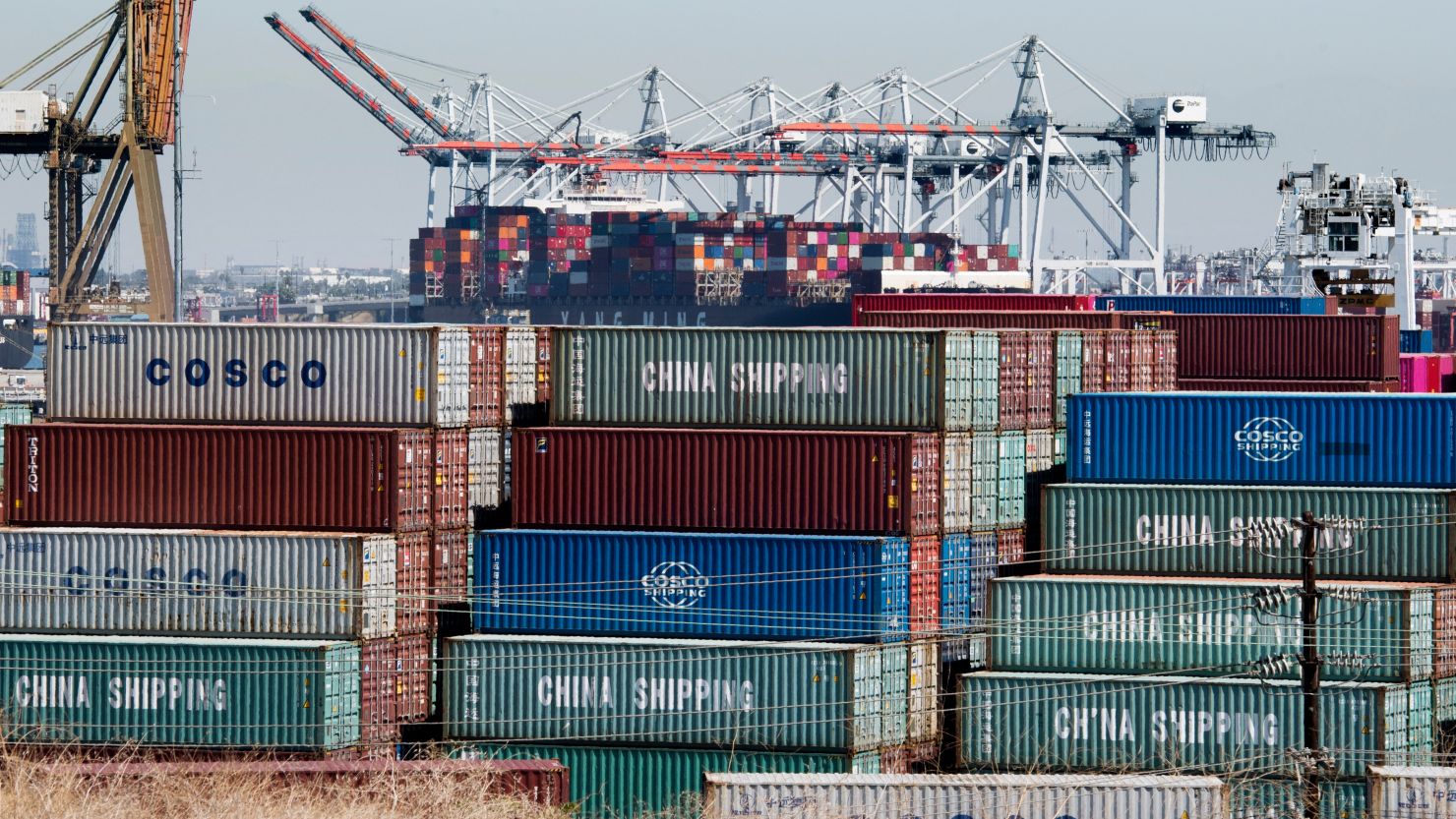Shipping containers from China and other Asian countries are unloaded at the Port of Los Angeles in Long Beach, California, on September 14, 2019.