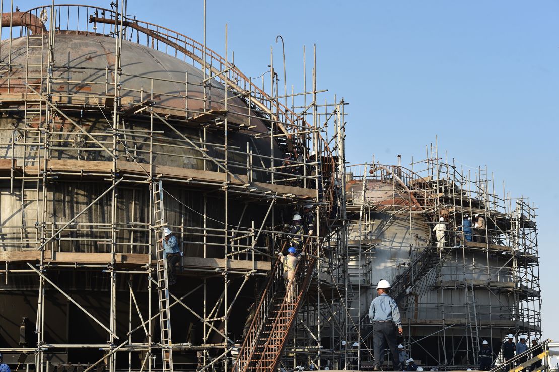 Employees of ARAMCO Petroleum Company work at ABQAIQ Petroleum Processing Factory in Saudi Arabia on September 20, 2019. The attacks on the two facilities have cut crude oil production by halving. A strike at ABQAIQ, the world's largest oil processing facility, and Khurais oil field in the Roiled Energy market in eastern Saudi Arabia.