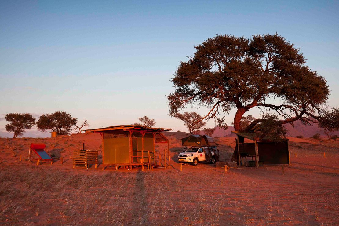 Sunrise over the Family Hideout camping site in NamibRand Nature Reserve.