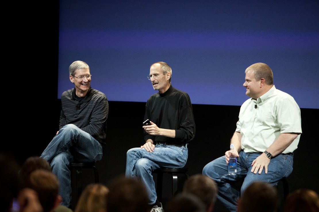 Apple CEO Steve Jobs talks about iPhone4 with Apple Chief Operating Officer, Tim Cook, left, and senior vice president of Mac Hardware Engineering, Bob Mansfield, during a Q and A at Apple headquarters in Cupertino on Friday, July 16, 2010.